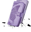 Etui z klapką Butterfly do Realme C71 – eleganckie i funkcjonalne, fioletowe